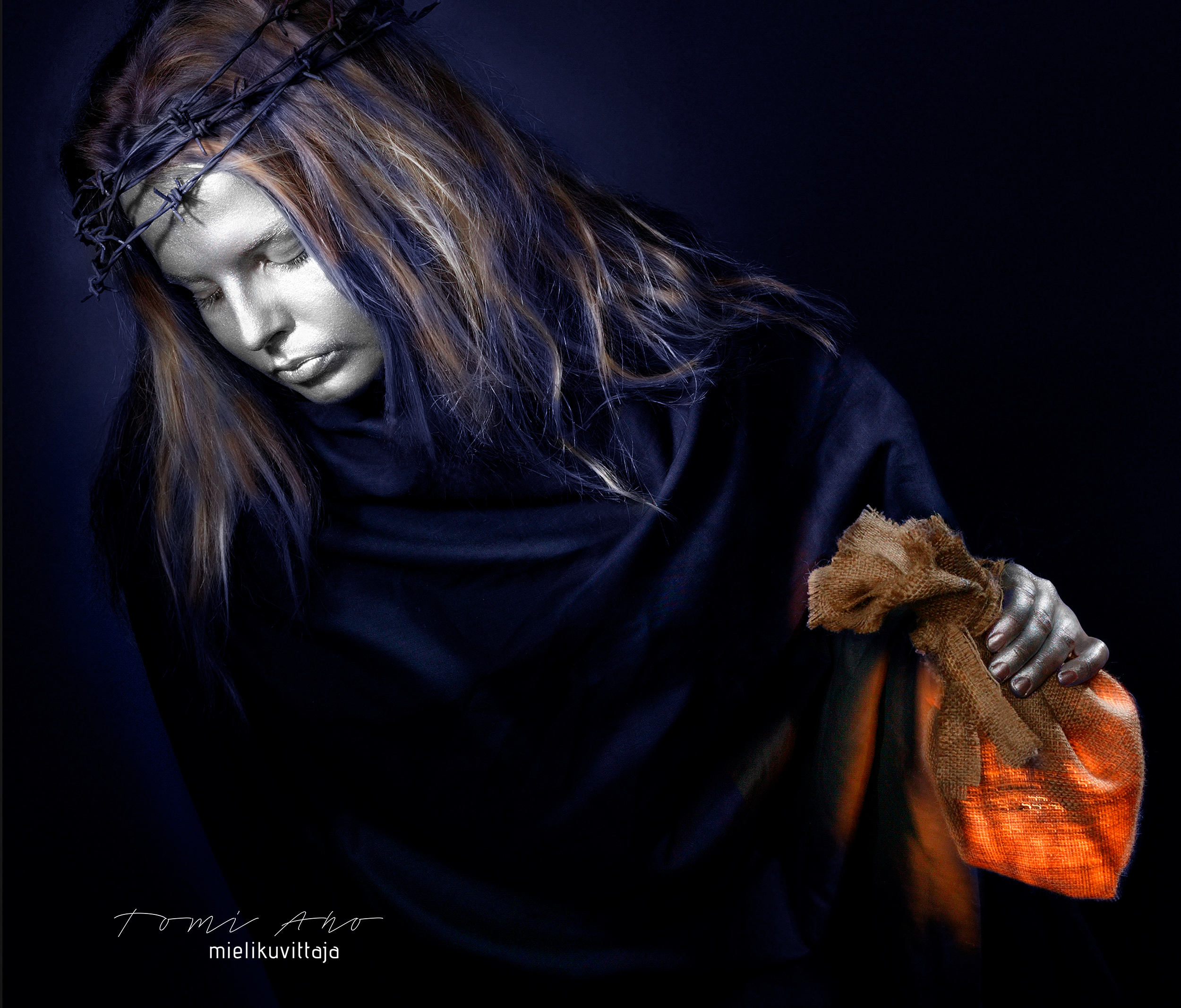 Taidemuotokuva valonkantaja Mielikuvittaja Tomi Aho